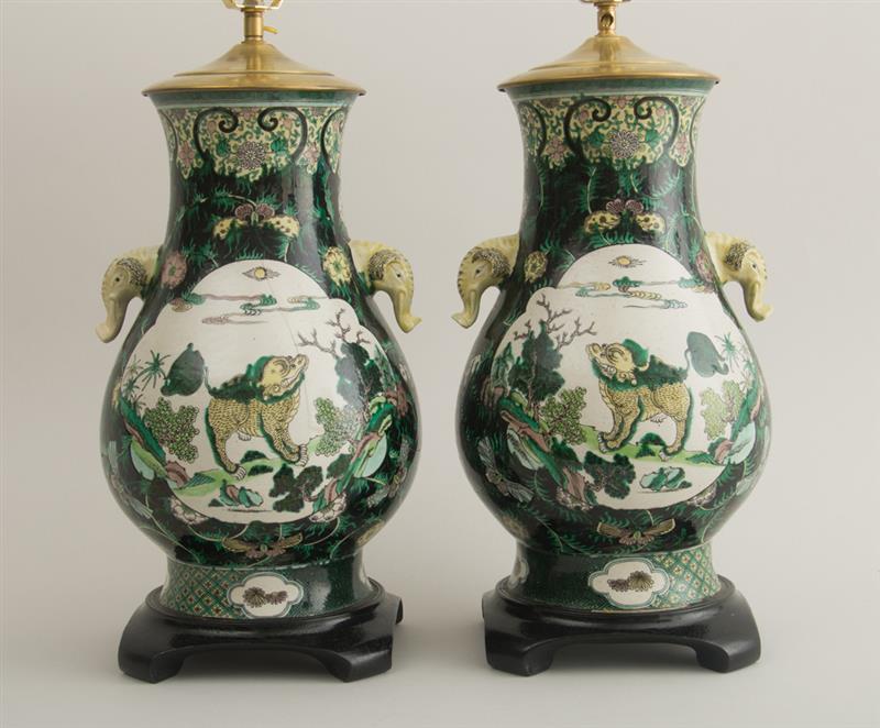 Appraisal: PAIR OF CHINESE BLACK GROUND FAMILLE VERTE PORCELAIN PEAR-FORM VASES