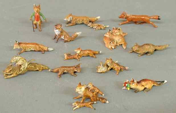 Appraisal: Thirteen miniature cold painted bronze fox figures tallest h