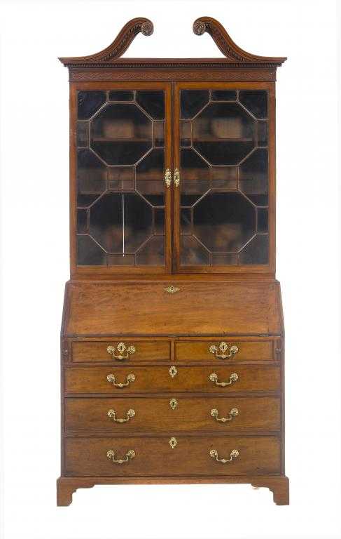 Appraisal: A GEORGE III MAHOGANY BUREAU BOOKCASE with swan neck pediment