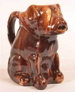 Appraisal: Rockingham Glazed Yellowware Dog Pitcher th Century Rockingham Glazed Yellowware