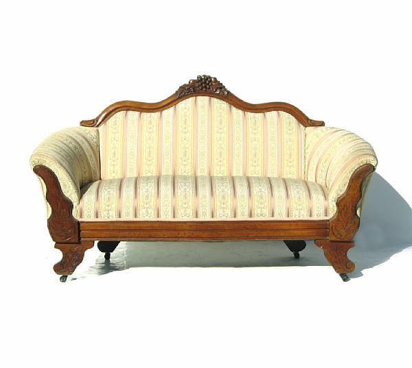 Appraisal: A carved mahogany upholstered settee losses height in width ft