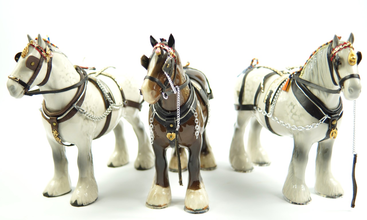 Appraisal: A pair of Beswick dappled grey shire horses and another