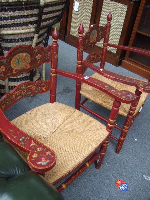 Appraisal: A pair of Scandanavian style red painted open armchairs with