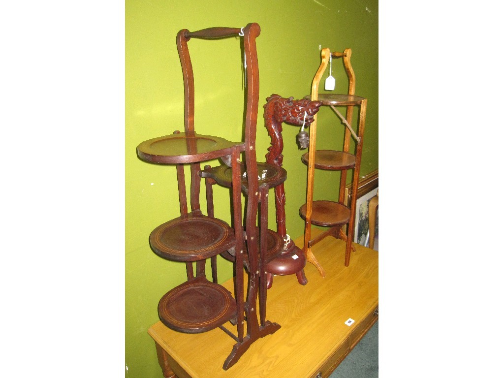 Appraisal: Lot comprising two cakestands and an eastern style lamp