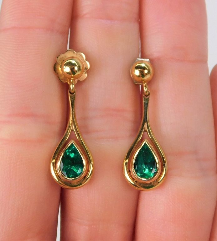 Appraisal: K Gold Channel Set Pear Shape Emerald Earrings United States