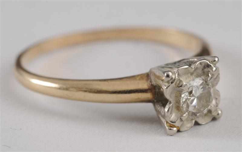 Appraisal: DIAMOND AND GOLD RING The round cut diamond in a