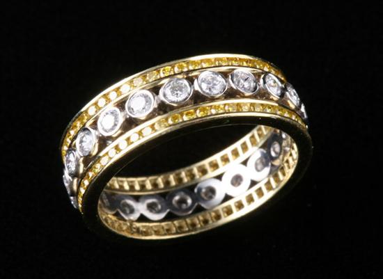 Appraisal: K YELLOW GOLD PLATINUM AND YELLOW AND WHITE DIAMOND ETERNITY