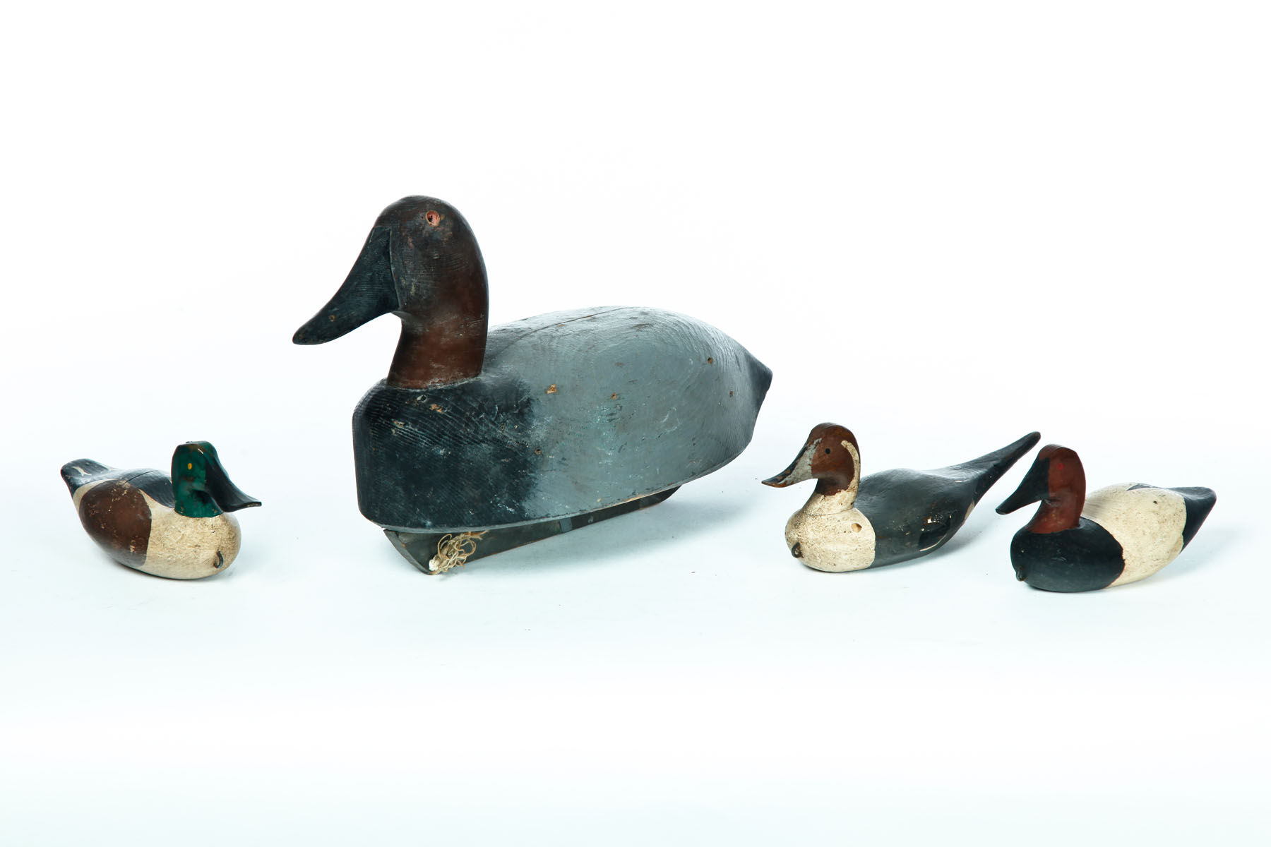 Appraisal: FOUR DECOYS American nd half- th century Three miniature or