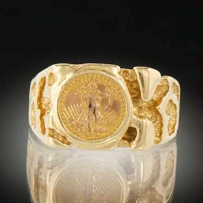 Appraisal: A Gold Coin Ring k yellow gold pinky ring of