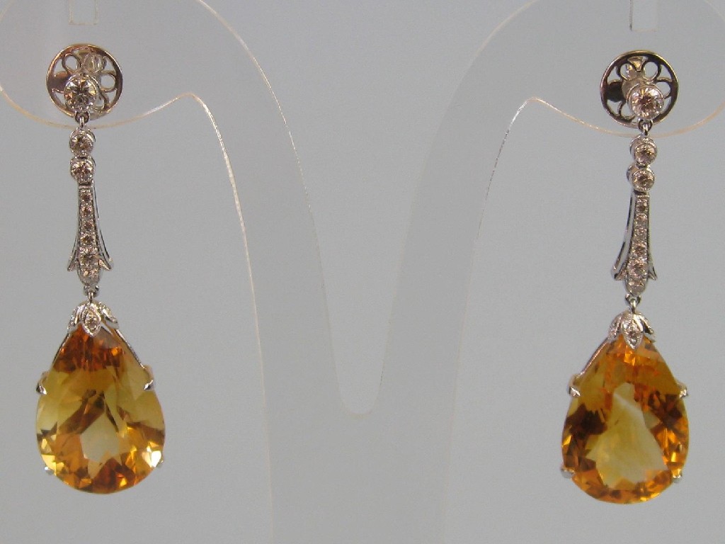 Appraisal: A Pair of Contemporary Citrine and Diamond Ear Pendants each