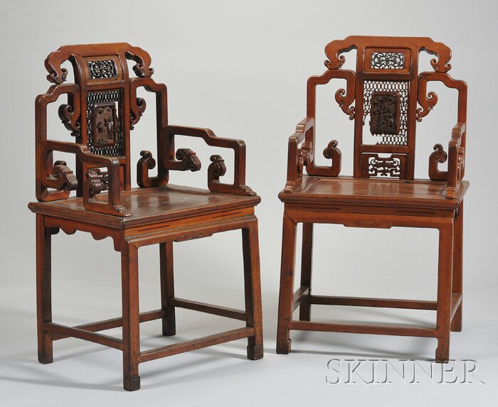 Appraisal: Pair of th Century Chinese Carved Elmwood Armchairs Provenance Ex