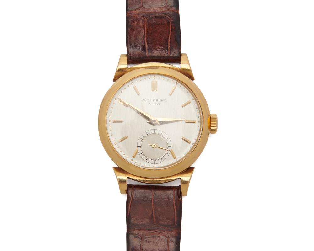 Appraisal: PATEK PHILIPPE K Gold Wristwatch the silvered dial with applied