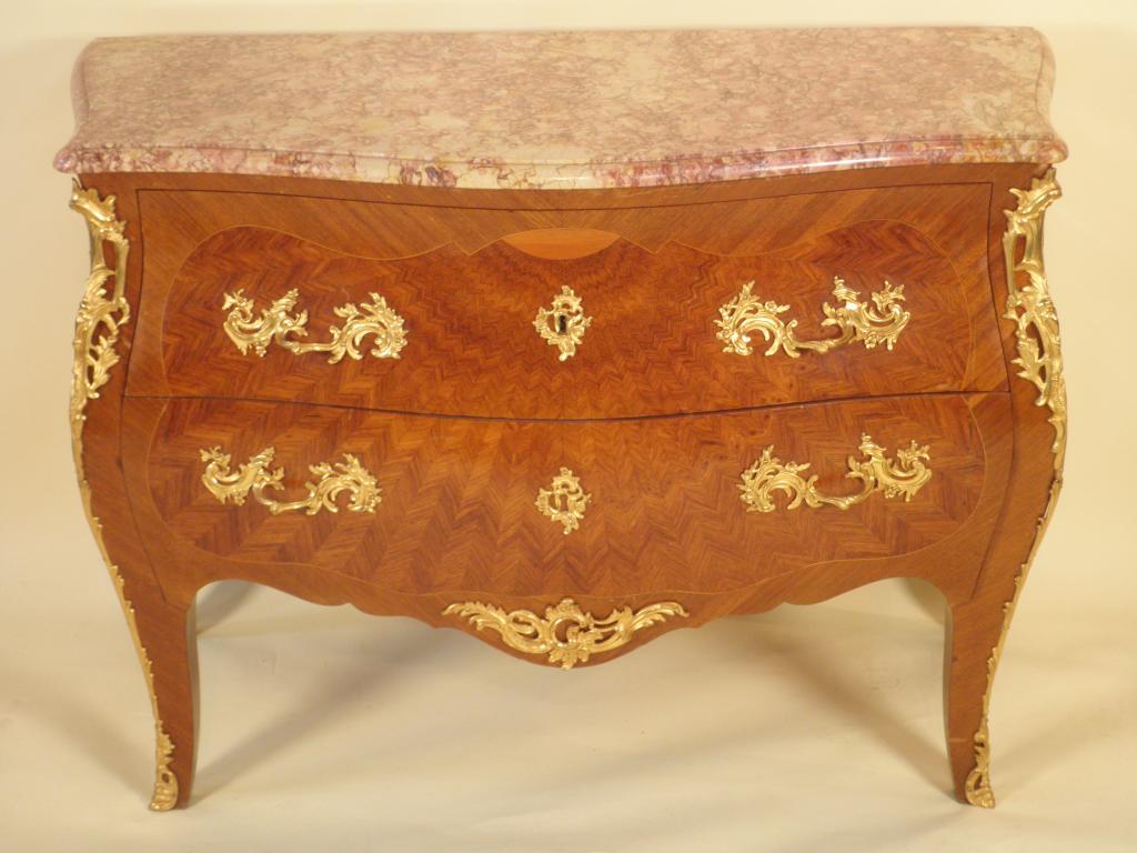 Appraisal: A mahogany kingwood and tulipwood bombe commode in Louis XV