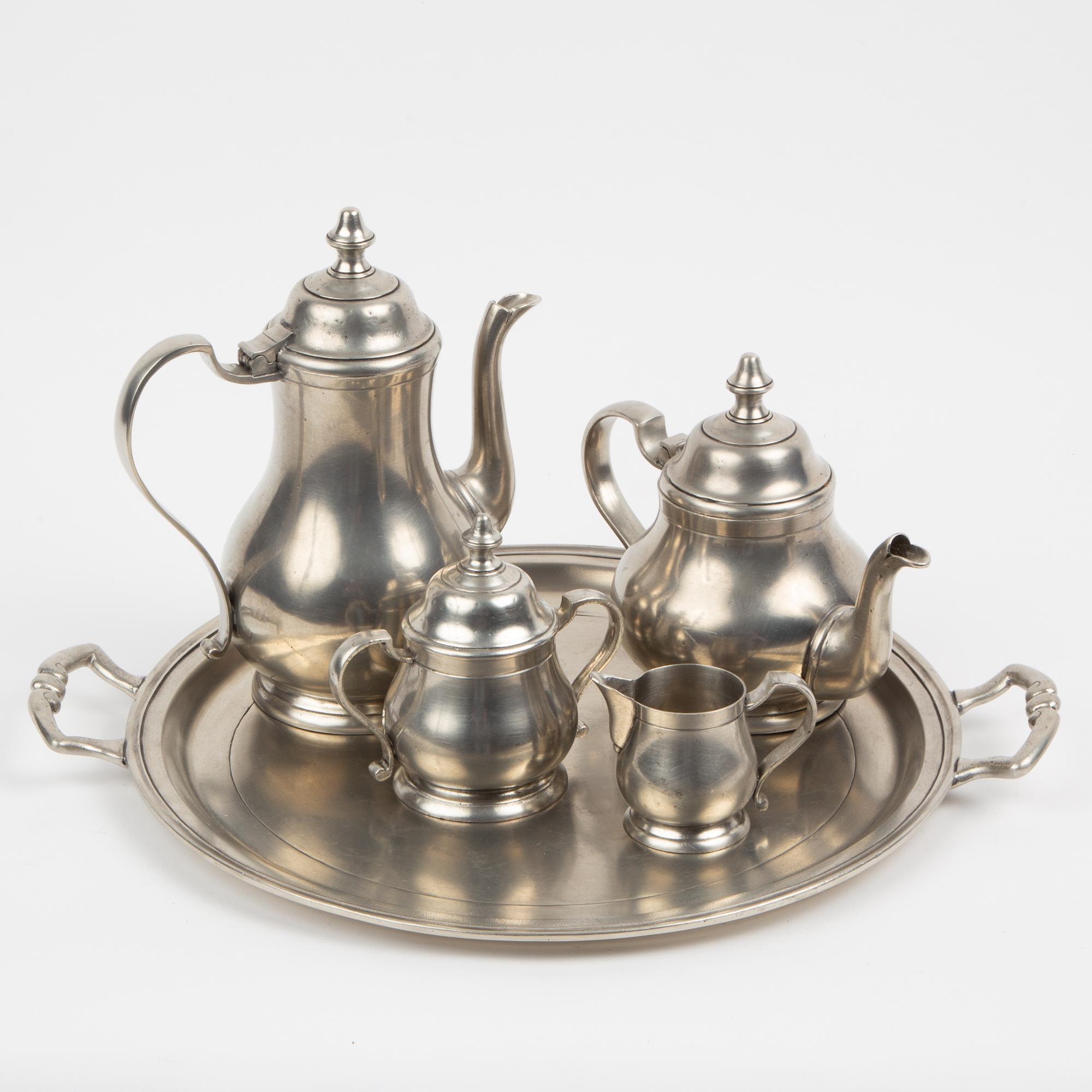 Appraisal: MATCH HANDMADE ITALIAN PEWTER TEA SET A five-piece MATCH Italy