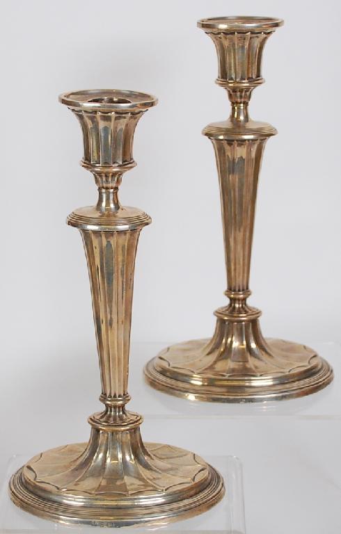 Appraisal: EARLY TWENTIETH CENTURY PAIR OF ADAM'S STYLE SILVER TABLE CANDLESTICKS