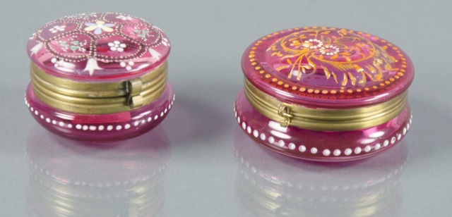 Appraisal: Two Moser Bohemian Cranberry Trinket BoxesHinged lid Both decorated with