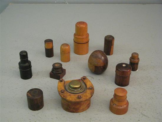 Appraisal: Small collection of treen travelling inkwells to include ebony rosewood