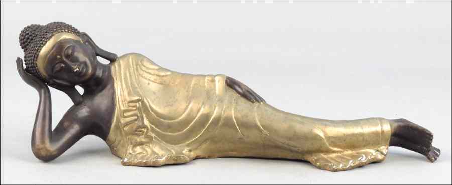 Appraisal: THAI PARCEL GILT BRONZE RECLINING BUDDHA Length '' Condition No