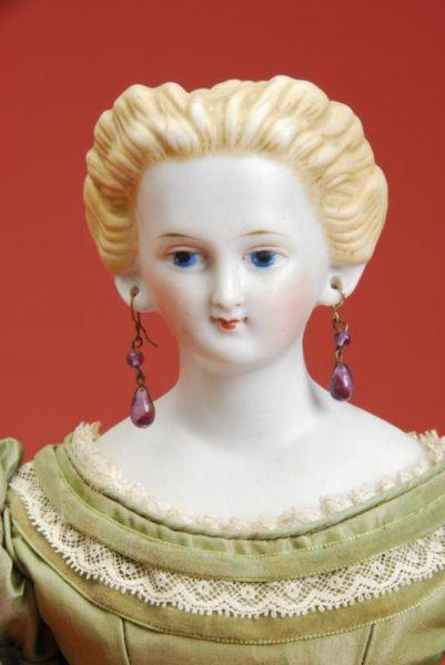 Appraisal: Unusual Parian Lady with Pierced Ears Germany ca untinted bisque