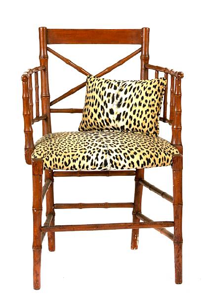 Appraisal: A paint decorated faux bamboo armchair together with a gilt