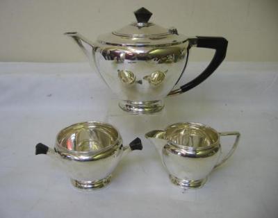 Appraisal: A THREE PIECE ART DECO TEA SET of tapering circular