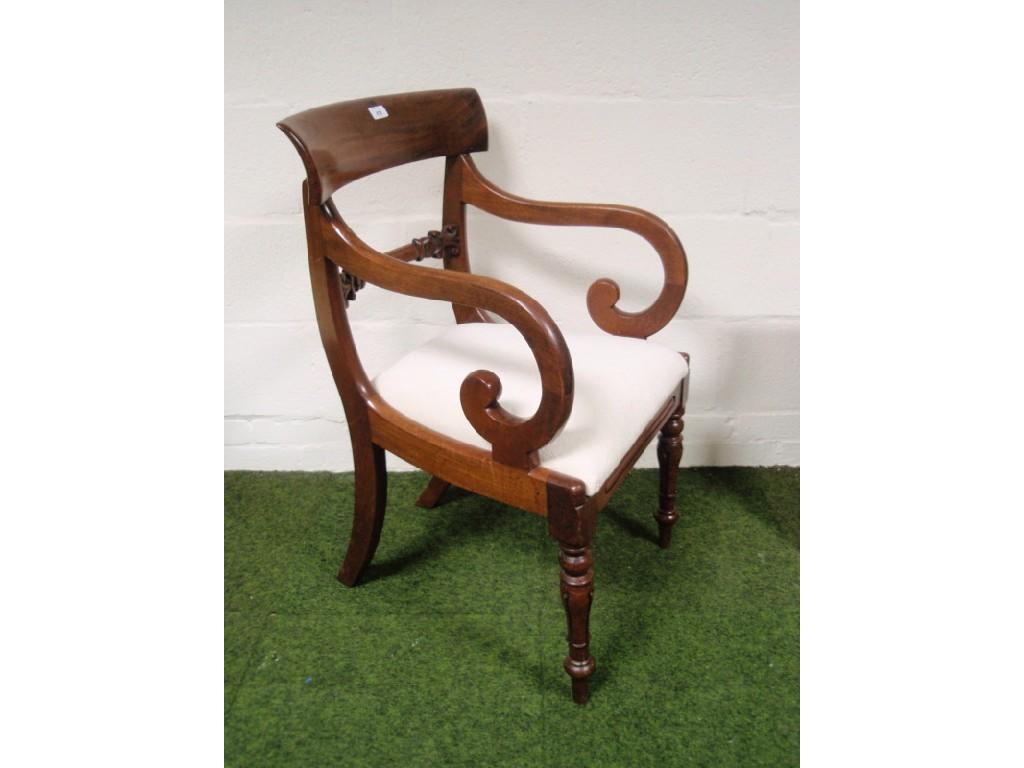 Appraisal: A pair of Regency mahogany bar back carver chairs with