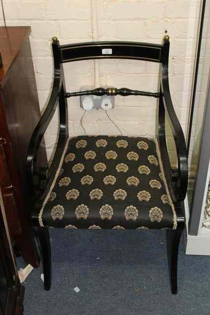 Appraisal: A SET OF EIGHT REGENCY STYLE EBONISED DINING CHAIRS consisting