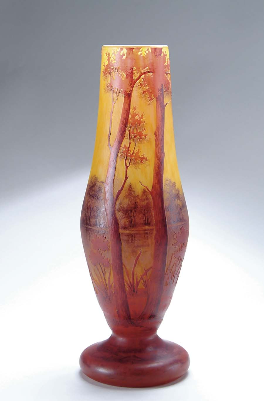 Appraisal: DAUM AUTUMN SCENE VASE Wonderful large Daum vase has brick