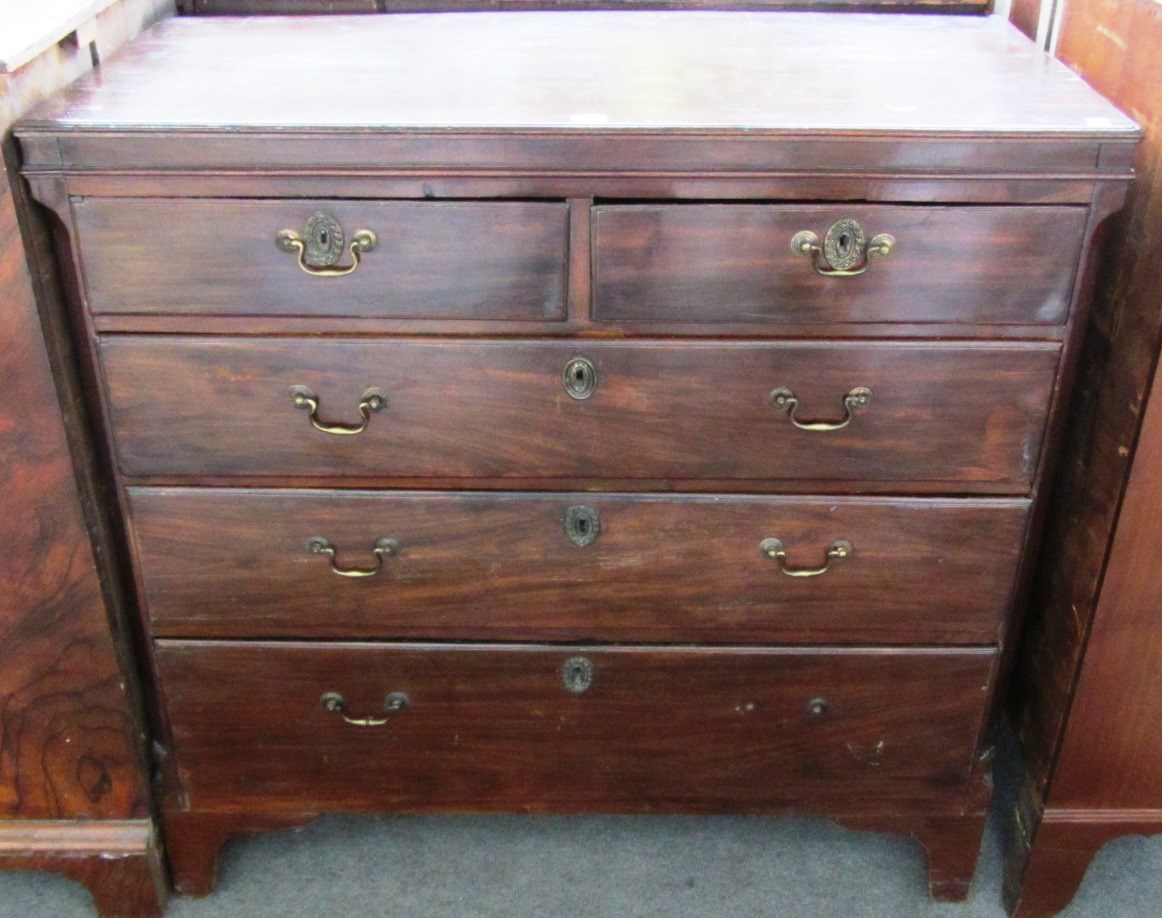 Appraisal: A George III mahogany chest of two short and three