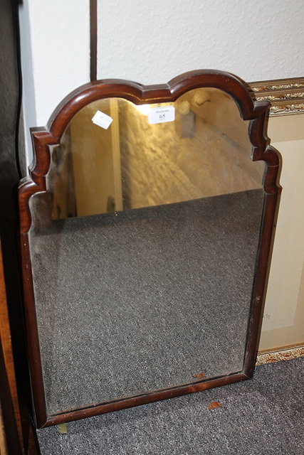 Appraisal: AN EDWARDIAN QUEEN ANNE STYLE SHAPED MAHOGANY WALL MIRROR cm