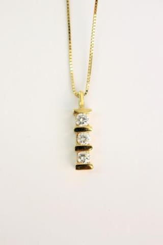 Appraisal: A K yellow gold necklace with three vertical bar set