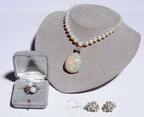 Appraisal: OPAL AND DIAMOND SET BINDER ca White gold Elegant set