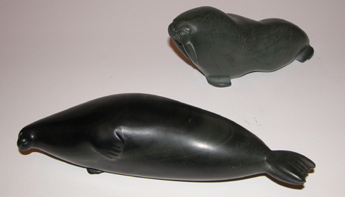 Appraisal: Two Inuit carvings Seal Walrus th Century Inuit School soap