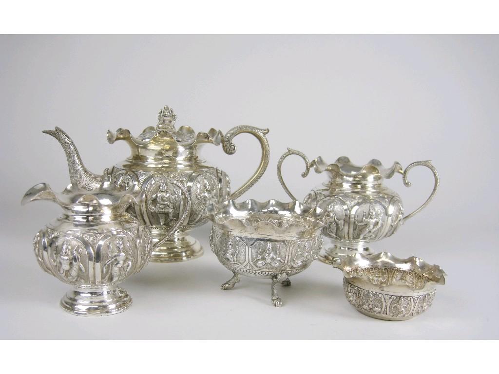 Appraisal: An Indian silver five piece Tea Service embossed and chased