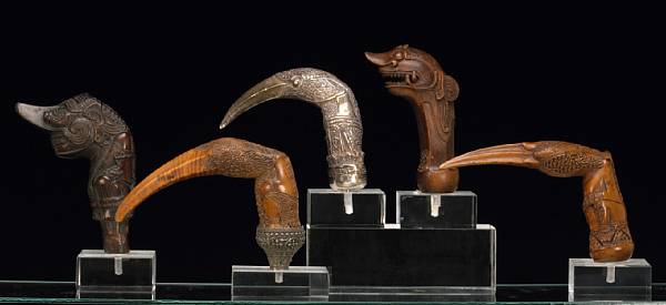 Appraisal: A lot of five Indonesian keris hilts th th century