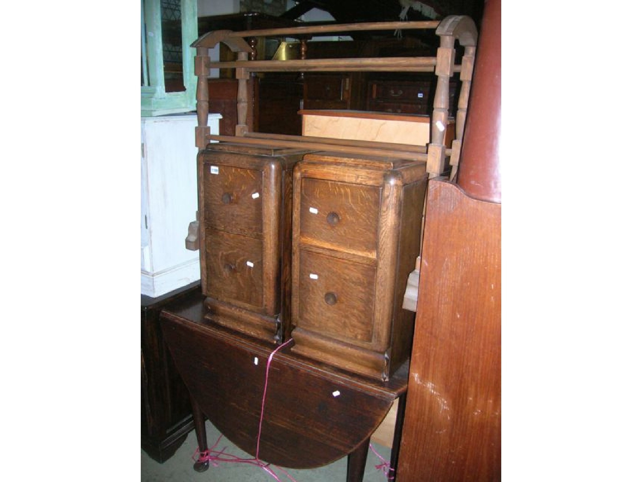 Appraisal: A Georgian oak pad foot table with oval drop leaves