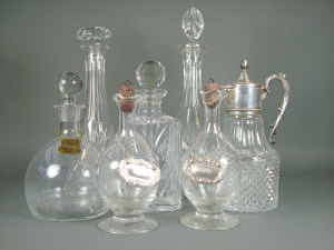 Appraisal: A selection of moulded and cut glass decanters and other