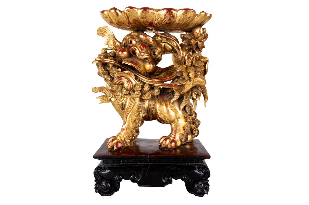 Appraisal: CHINESE CARVED GILTWOOD FOO LIONon an integral wood base inches