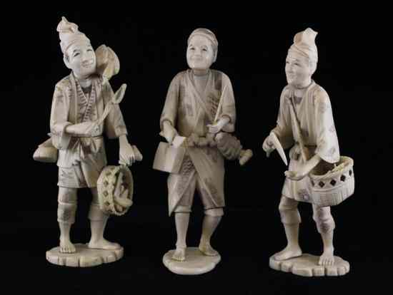 Appraisal: Three Japanese sectional walrus ivory figures early th century depicting