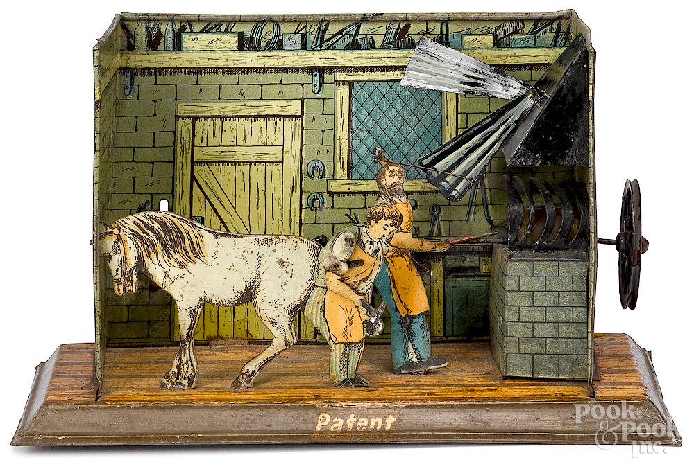 Appraisal: Schoener blacksmith shop steam toy accessory Schoener tin lithograph blacksmith