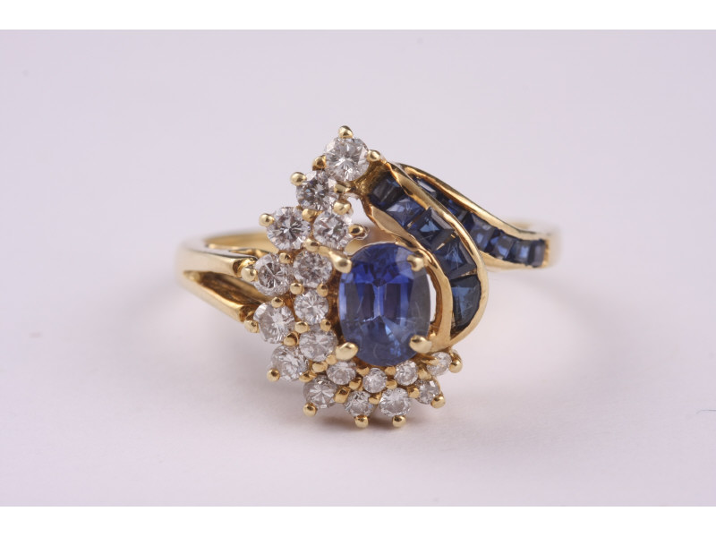 Appraisal: KT Yellow Gold Sapphire and Diamond Ring one ct oval