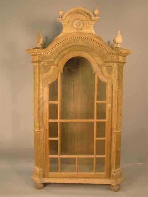 Appraisal: SWEDISH PINE CABINET th century the arched molded cresting centering