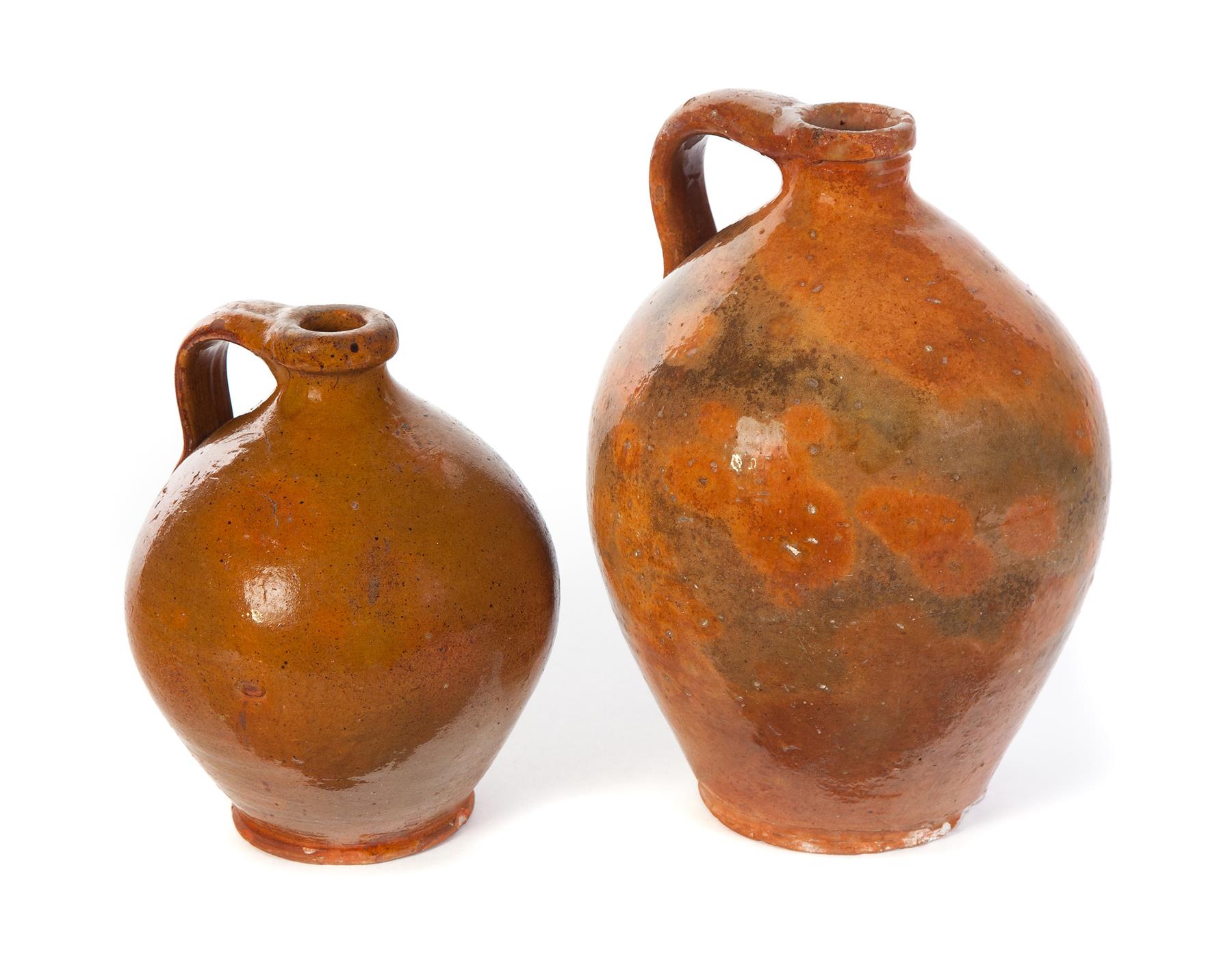 Appraisal: TWO GALENA POTTERY JUGS Illinois mid- th century Ovoid with