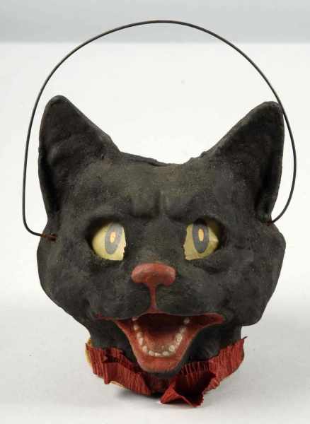 Appraisal: Composition Cat Jack-O-Lantern Description German Flocked black cat shown with