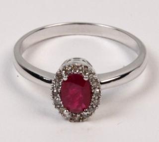 Appraisal: K WHITE GOLD DIAMOND AND RUBY LADY'S RING HAVING CT