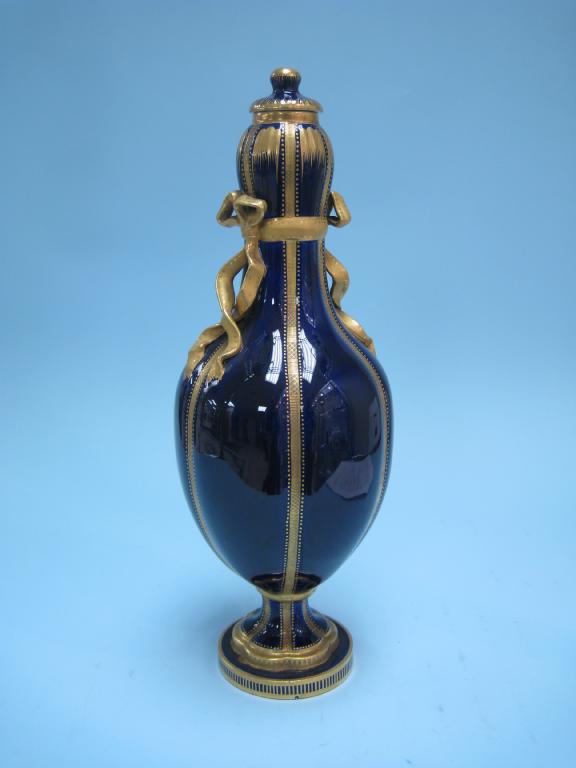 Appraisal: A Coalport ovoid Vase and Cover moulded ribbons in gilt