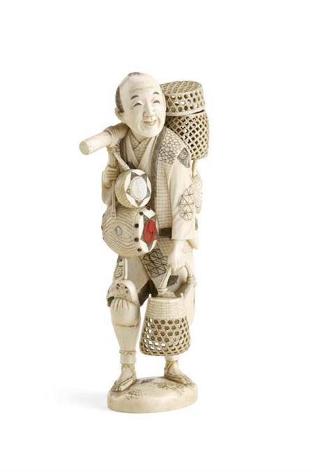 Appraisal: A Japanese ivory okimono of a basket maker Meiji period