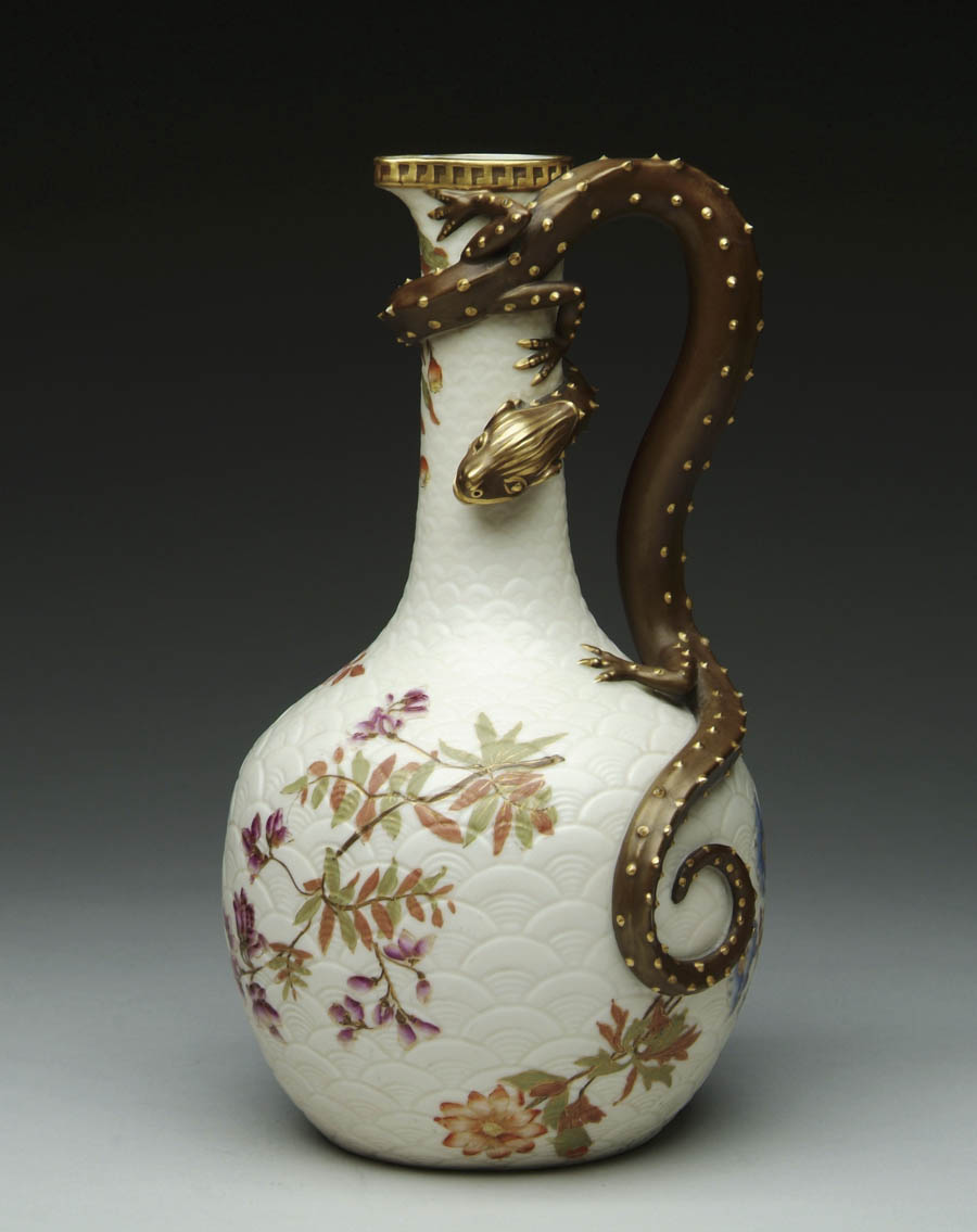 Appraisal: ROYAL WORCESTER SERPENT EWER Ivory white textured background with colorful