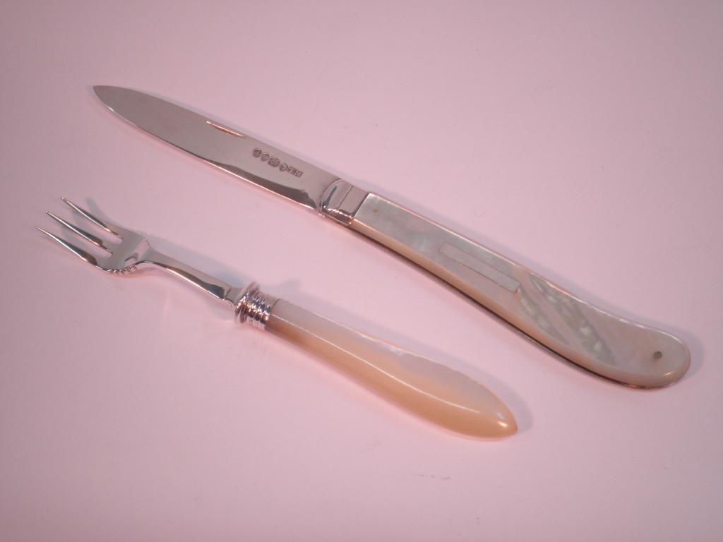 Appraisal: A mother-of-pearl and silver fruit knife the blade Sheffield and