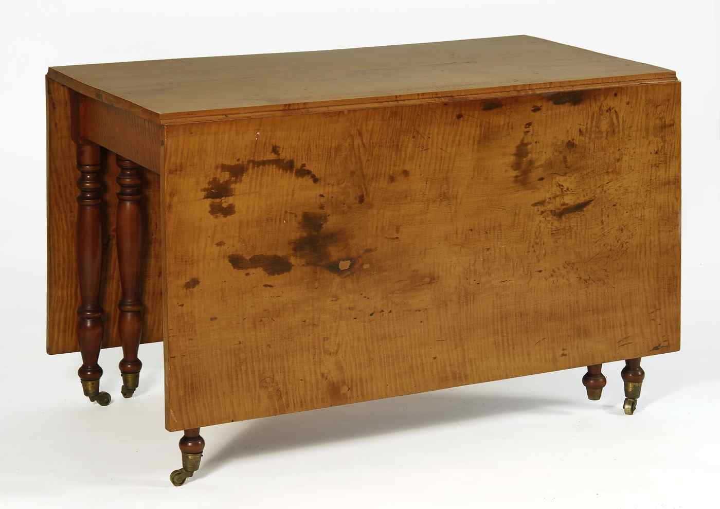 Appraisal: ANTIQUE AMERICAN SHERATON DROP-LEAF DINING TABLECirca In tiger maple Turned